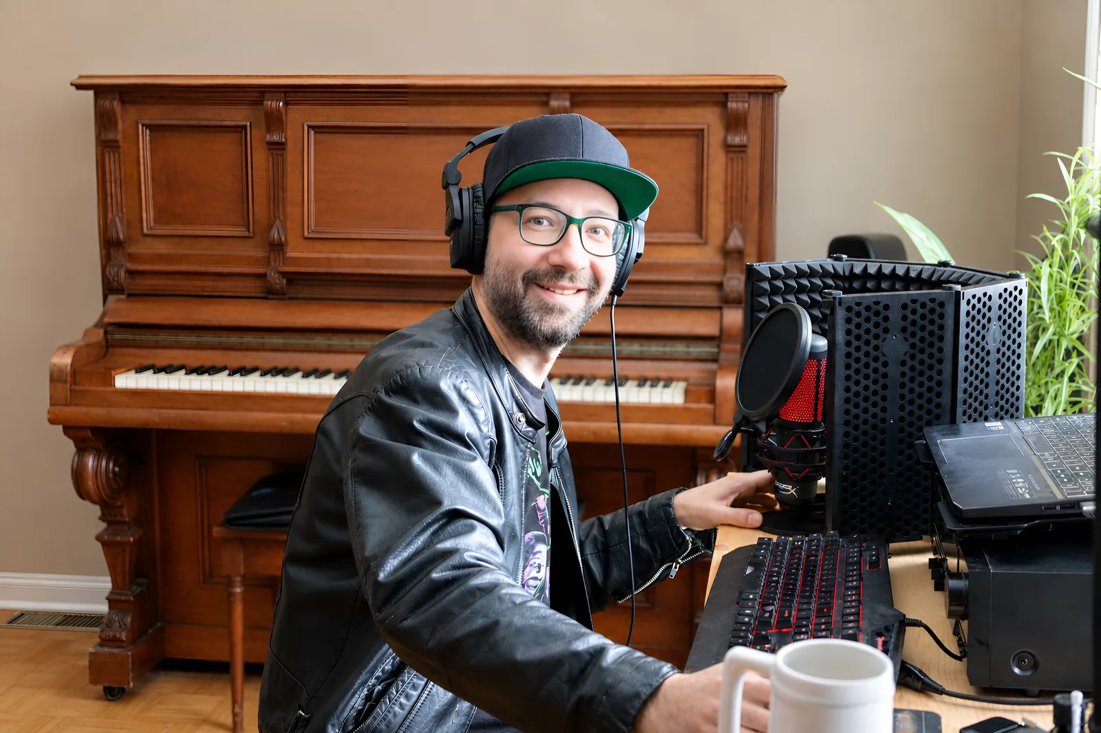 The studio: a desk with monitors, microphone and lights